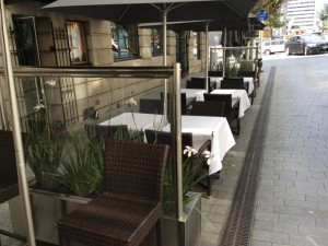 Heatmax café screens enclosing outdoor space